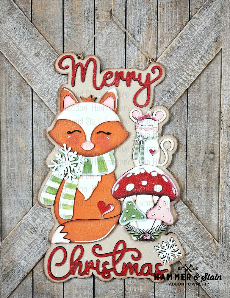 Forest Friends Christmas  door hanger with fox, mouse, and mushroom on a wooden background